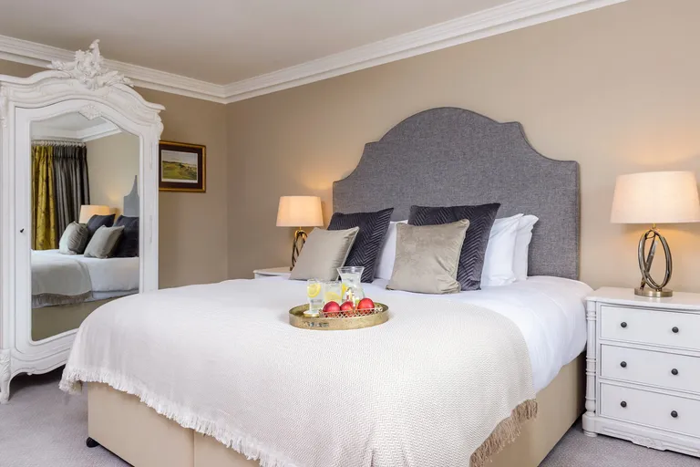 The Junior King room at Kenmare House, light and elegantly furnished